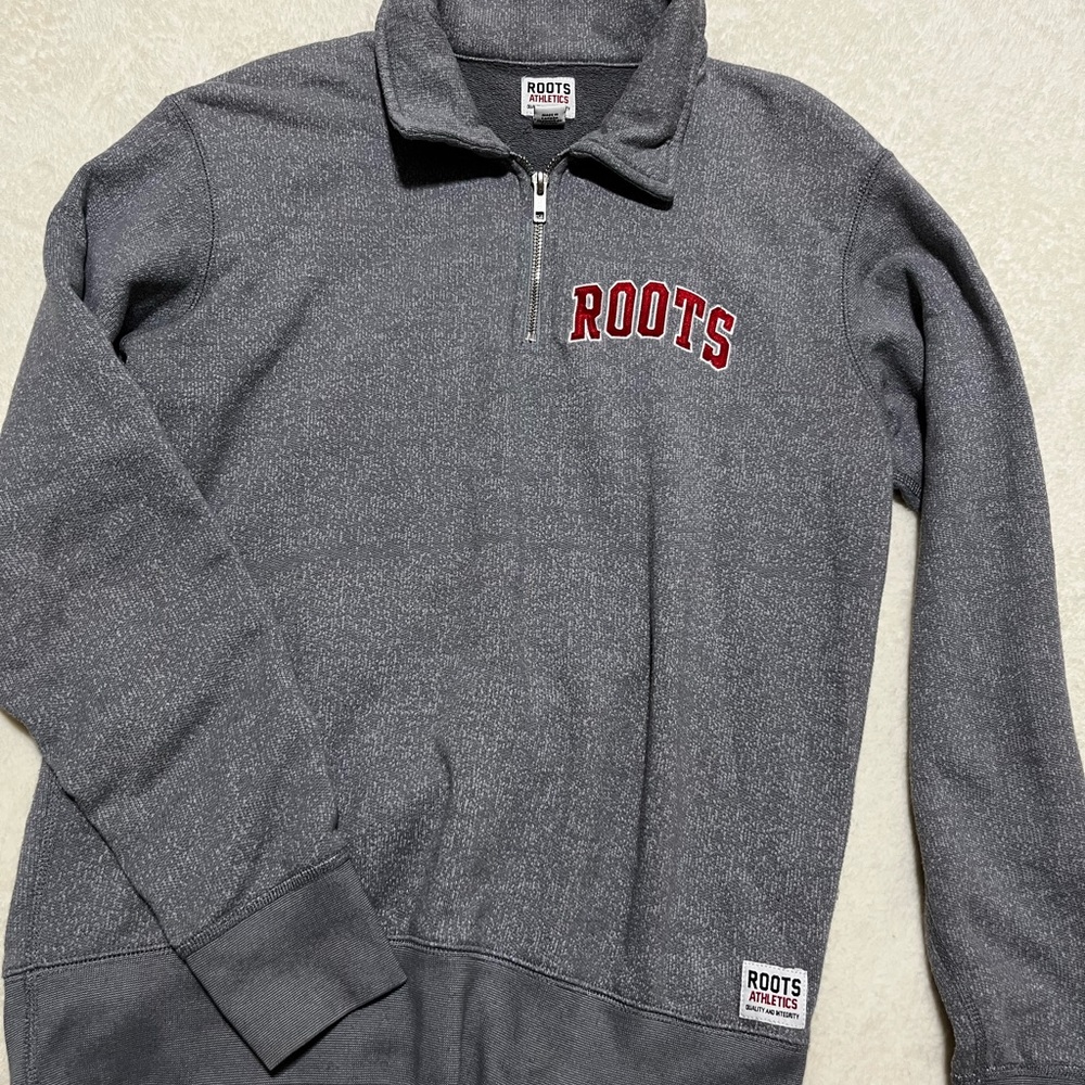 roots original half zip spellout sweatshirt